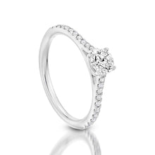 Load image into Gallery viewer, Image: This Classic Solitaire Ring is crafted with 14 white gold featuring a .43-carat diamond center in VVS2, color J and 20 pieces of .37-carat total weight side stones with a clarity grading of&nbsp; VS-SI and in the color G-H.
