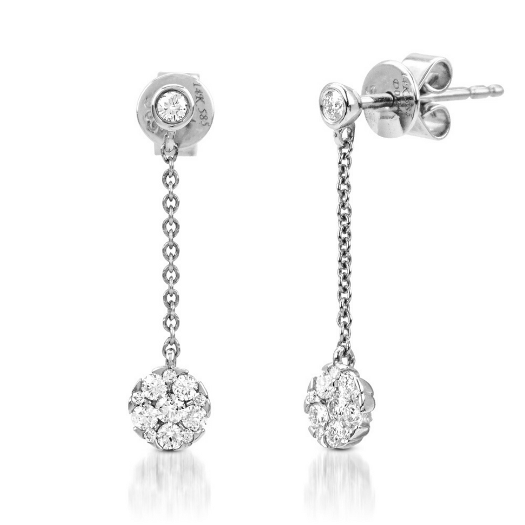 The Cluster Drop Earrings are crafted in 14K White Gold that features 24 pieces of 0.24-carat diamonds. Perfect dangling earrings for social gatherings