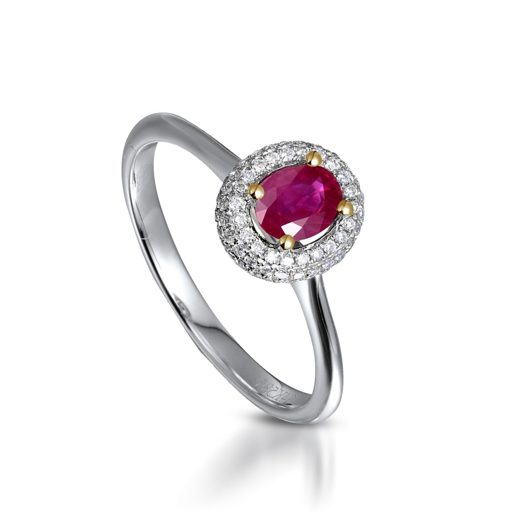 My Diamond Philippines Jewelry stores The Oval-shaped Ruby and Diamond Halo Style ring is crafted in 14K white gold and a yellow gold prong featuring 1 piece of 0.46-carat ruby and 72 pieces of .16 carat diamonds in total carat weight with clarity grading VS-SI1 and combination of colors G-H.