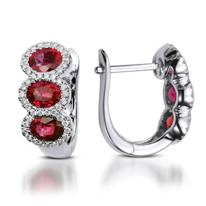 The Three-stone Ruby with Diamond Halo Clip Earrings is crafted with 14K white gold featuring 6 pieces of 1.53-carat rubies and 88 pieces of 0.20-carat diamonds with a clarity grading VS-SI1 in the combination of colors G and H.  Inclusive of My Diamond Jewelry Box and Jewelry Certificate 