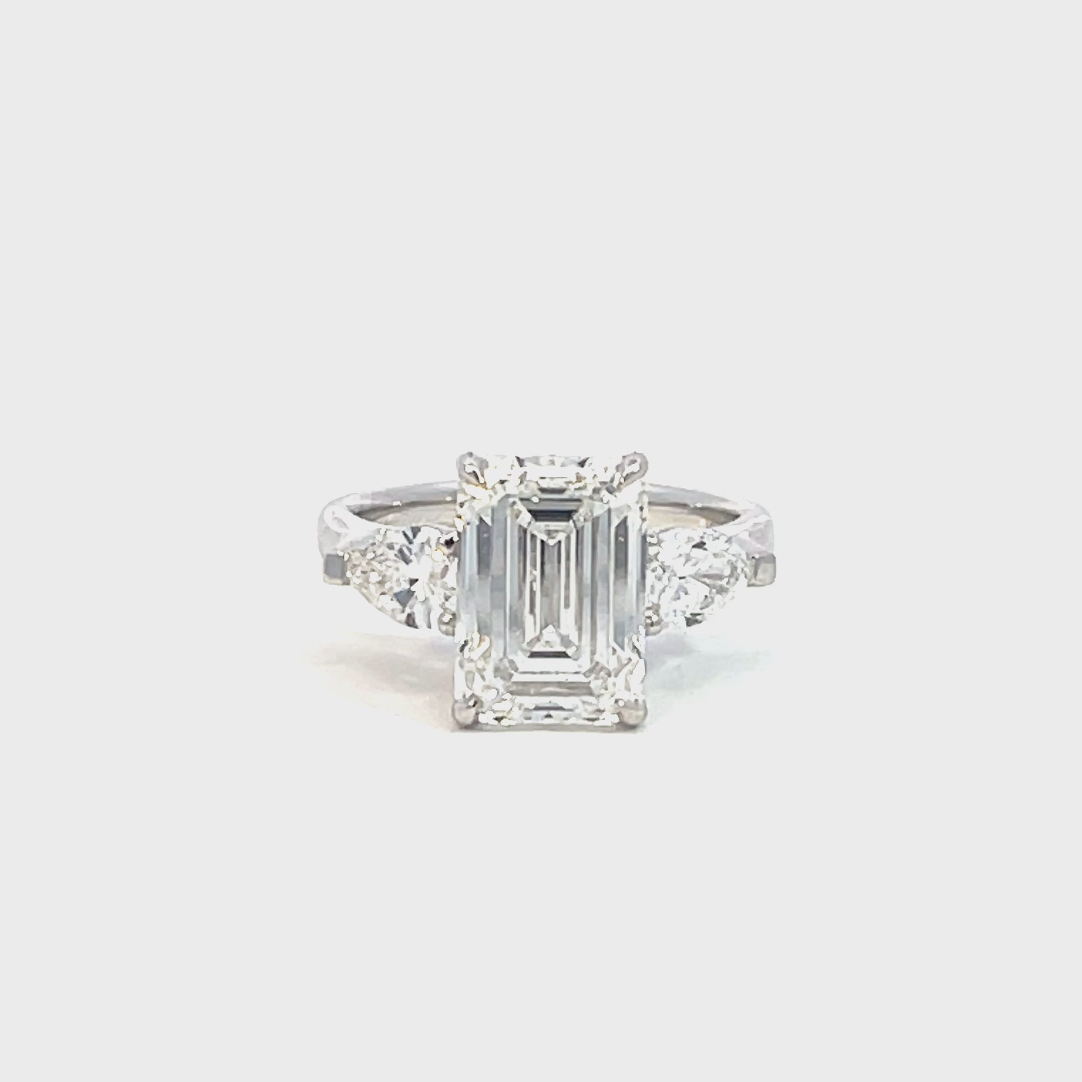 14K White Gold Lab Grown Diamond Ring with Emerald Cut Center stone and Pear Shaped Side Stones
