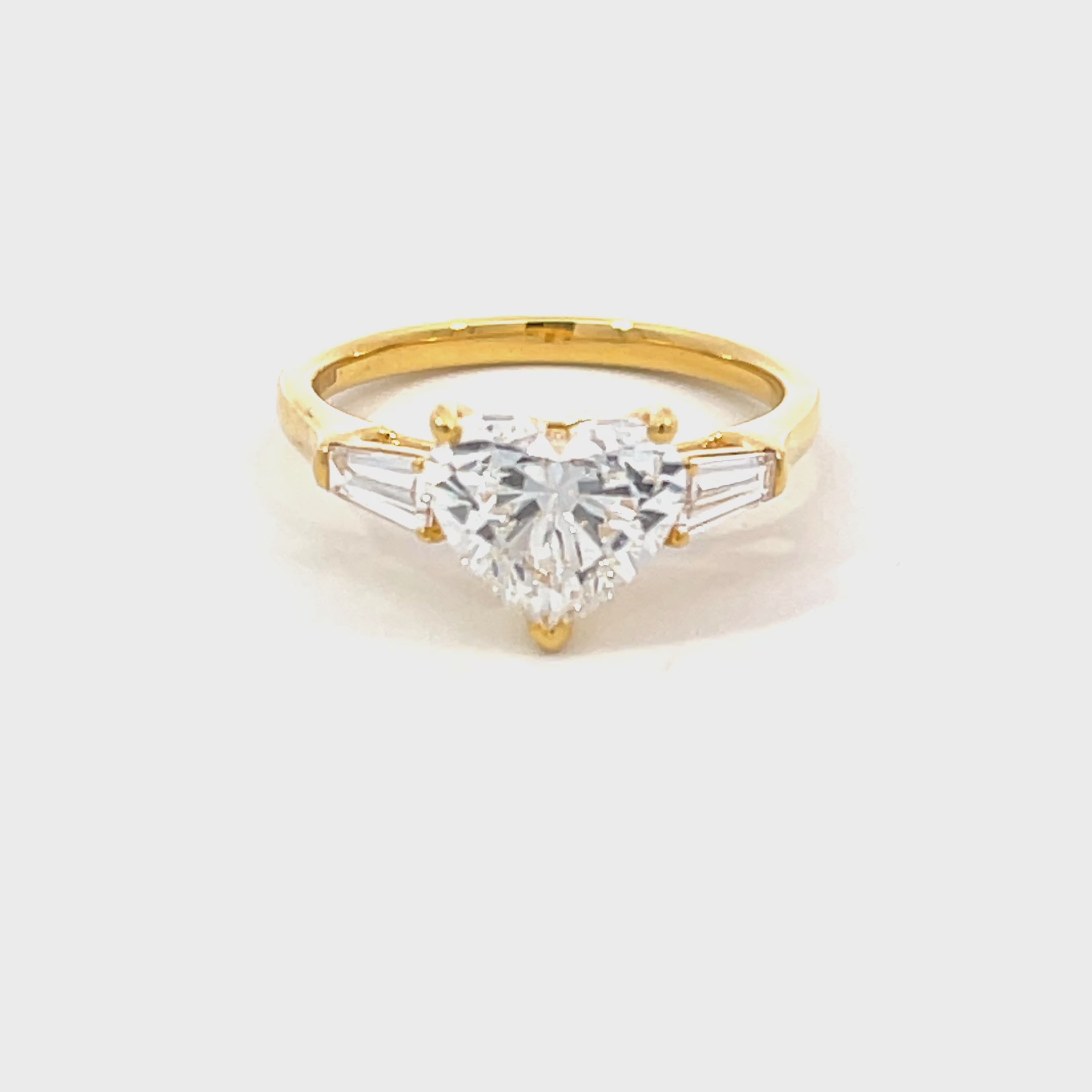 14K Yellow Gold Lab Grown Diamond Ring with Heart Shaped Center Stone and Tapered Baguette Side Stones